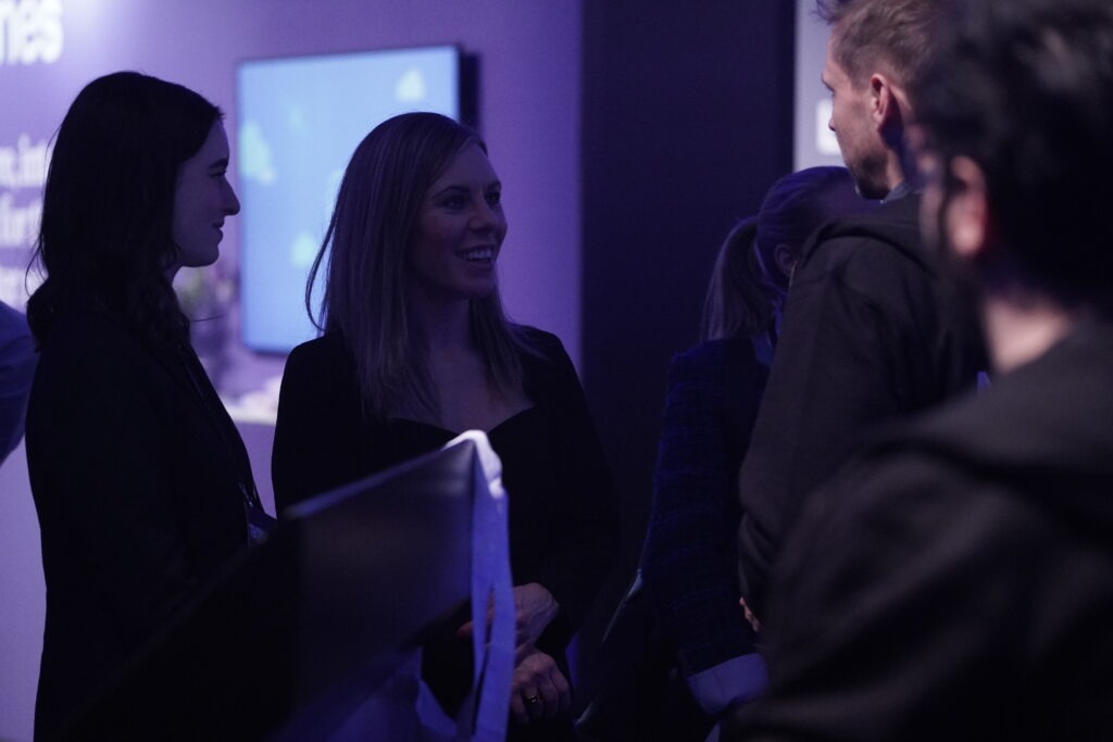 Attendees in conversation with the Mimer AI Factory team at the TechArena 2026 exhibition.
