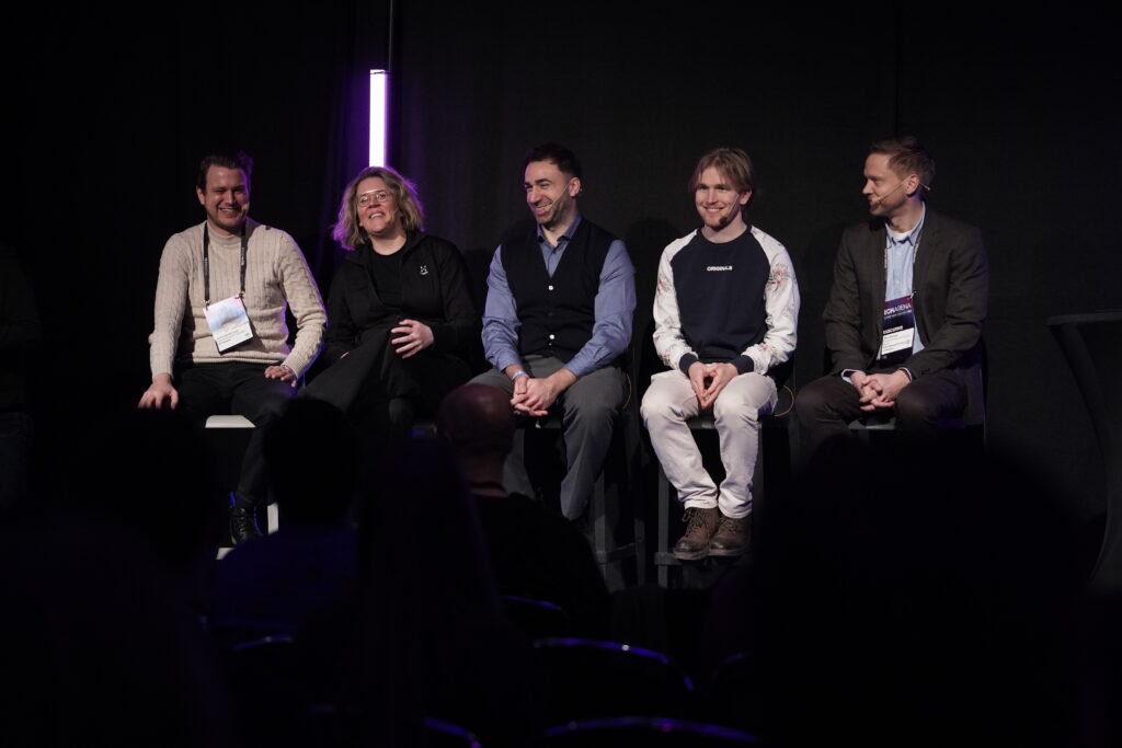 Panel speakers seated on stage during Mimer AI Factory’s AI development event at TechArena 2026.