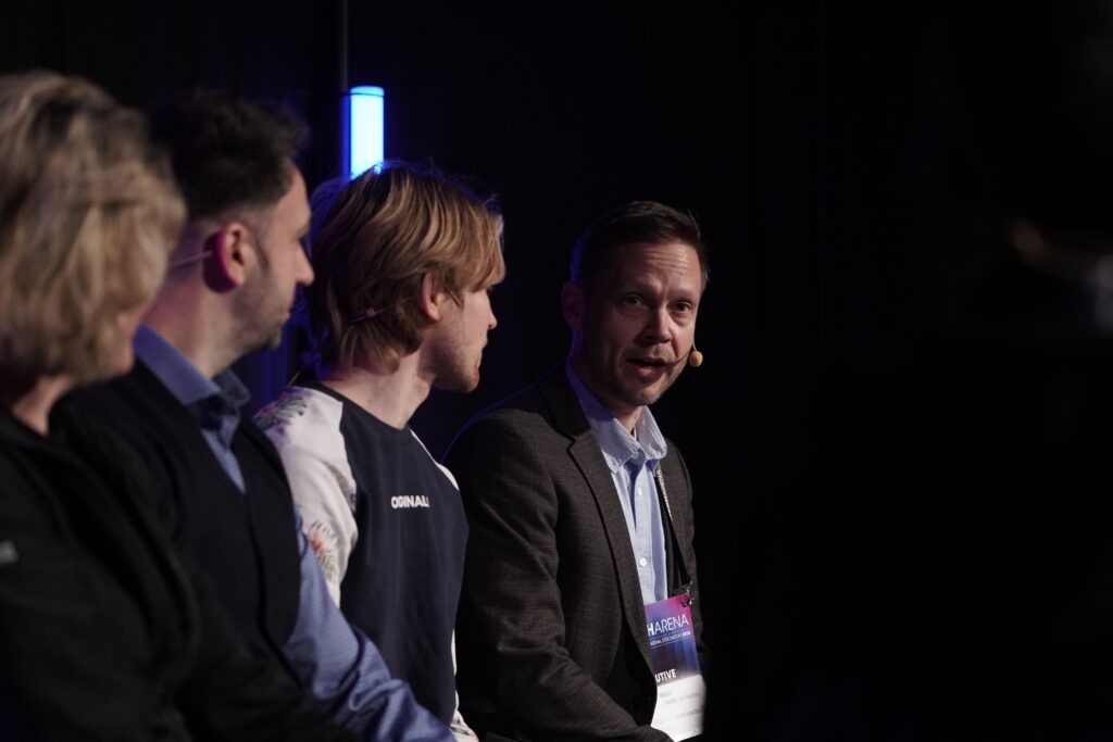 Speakers in conversation on stage at the TechArena 2026 side event.